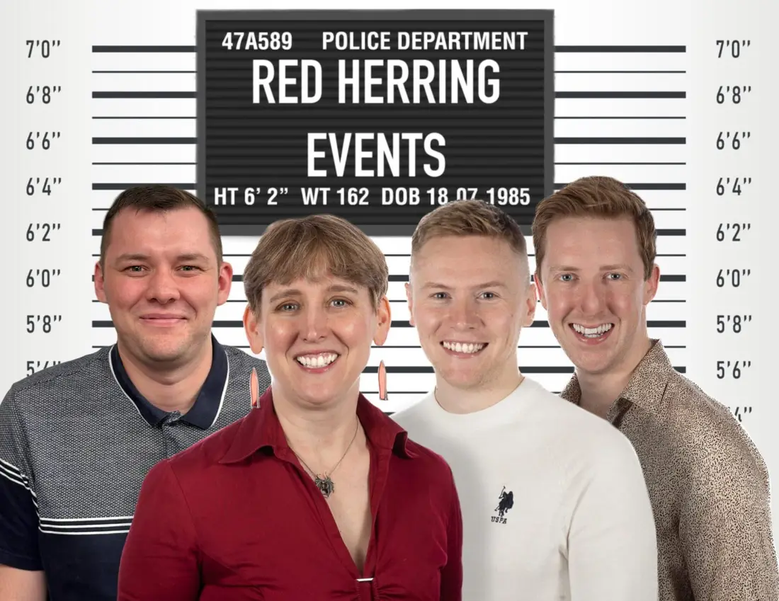 The Red Herring Events team in front of a police line-up board
