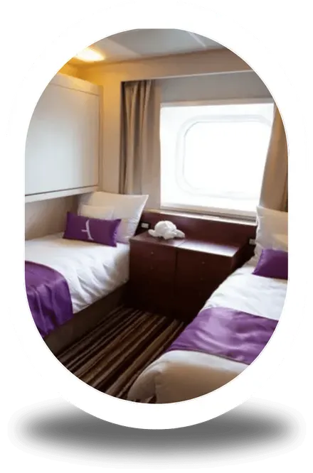 An ocean view cabin with twin beds and a sea-facing window