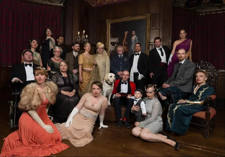 The full cast of a Red Herring Games murder mystery, posed in costume