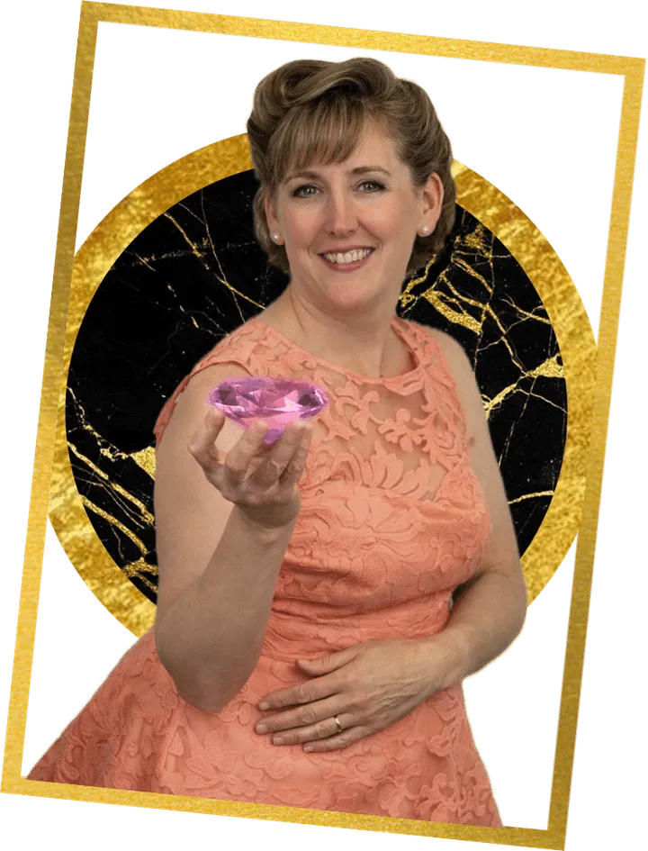 Jo from Red Herring Games holding the Pink Cougar Diamond